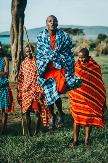Maasai youth performing the traditional Adumu jumping dance in Kenya.